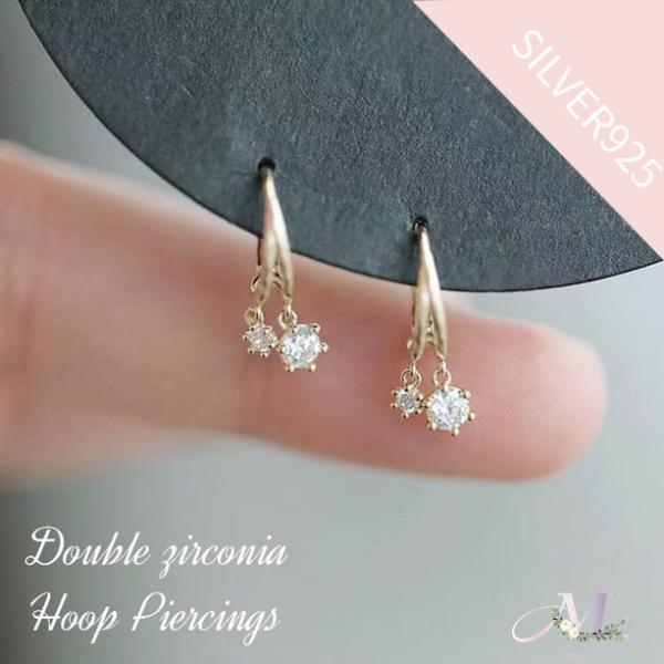 配送サイズ【3】★再入荷★大きさの異なるジルコニアがさりげなく耳元で揺れる大人かわいいフープピアス♪上品で小ぶりなサイズ感ながらも適度な抜け感を出してくれます☆フープピアスはキャッチを無くす心配がないキャッチレスで装着感が軽いのも◎普段使い...