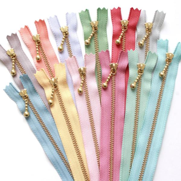 他サイト： YKK 玉付きファスナー ニュアンスカラー 20cm ゴールド 12色セット 3G20-N12MIXの商品画像