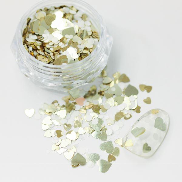 04 シルバーゴールド×ホワイト季節問わず使用いただける大人っぽい色合いが可愛いハートと丸のホロMIX。サッとのせるだけでアートが完成します。ハートと丸共に2~3種のサイズ入りでデザインやお爪のサイズに合わせて好きなサイズをご使用いただけま...