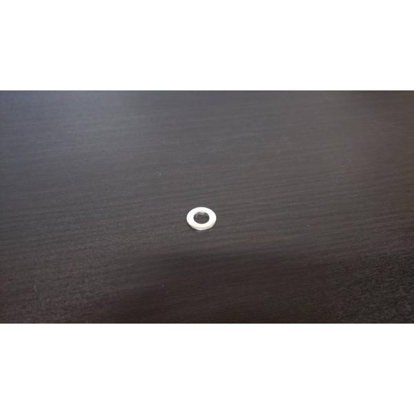 カムチェーンテンショナー周辺部品を組み付けた後に、オイルを注入するフィラー口のボルトのシーリングワッシャーです。潰れることで密着性を高めてくれるワッシャーとなります。基本、1回使ったら交換推奨となります。外径：12mm内径：6.5mm※ホン...