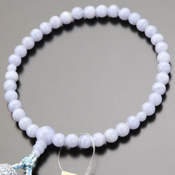 すべての宗派のお客様にお使い頂ける女性用のお数珠でございます。素材は、優しく淡いブルーに、静かにただよう波のような白い模様が美しいブルーレースでございます。近年、この美しい縞模様が見られる石が少なくなってきており、色も悪いのが大半を占めてき...