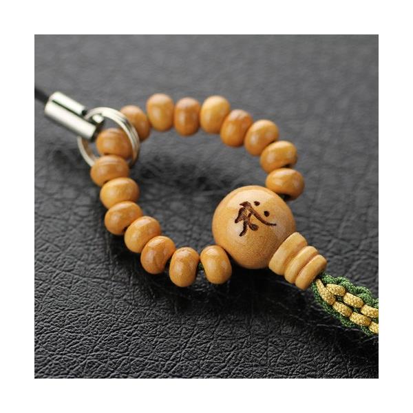 念珠ストラップです。仏壇などにも使用される丈夫な天然木使用。天然木なので軽く、小ぶりな数珠デザインがかわいい。お守りとしてもおすすめです。