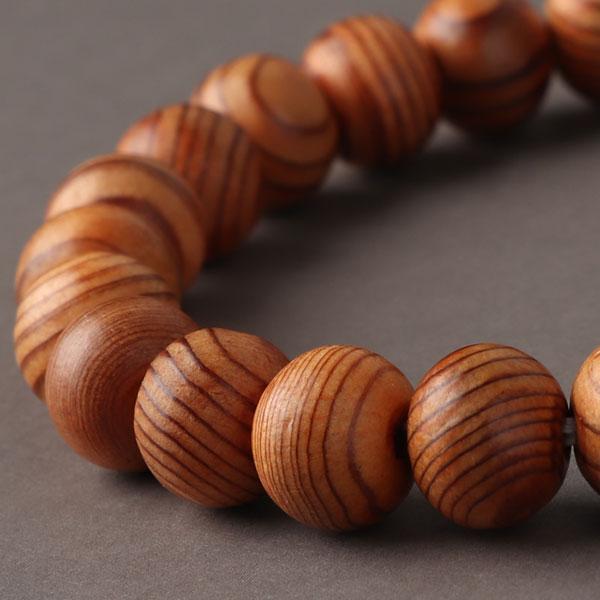 屋久杉を使用したブレスレットでございます。はっきりとした木目の美しい屋久杉をすべての玉に使用しました。軽く、腕の負担にならずにご愛用いただけます。≪素材≫ 屋久杉（約8×9ミリ）≪内周サイズ≫約15、16、17、18センチから選択可能≪付属...