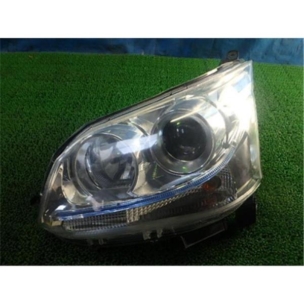 ダイハツ 純正 ムーブカスタム 《 LA100S 》 左ヘッドライト 81150