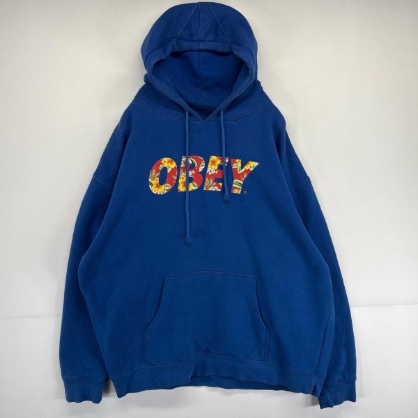 古着 オベイ OBEY パーカー プルオーバー  ビッグプリントロゴ フーディ 大きいサイズ スウェット XL  ブルー メンズ