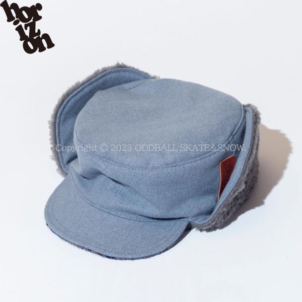 horizon THE SNOW CAP BLUE/GREY LONG/SHORT ホライゾン スノー フラップ キャップオールハンドメイドのスノーキャップはあごまで伸びたイヤーフラップが温かさを脱げにくさを実現。あご下でも頭頂でもゴムレー...