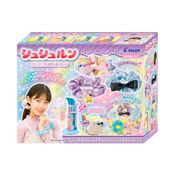 モダン水色/-/1863301・おしゃれなシュシュが簡単に何度でも作れます。 ・対象年齢：6才以上 ・セット内容：シュシュルン本体、シュシュ用生地×5、ゴムパーツ×3、ビーズパーツ、ほしチャーム、黒リボン、紫リボン、説明書