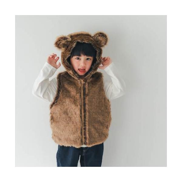 ブラウンミックスカラーが可愛いファーを使ったくまになりきれるフリースベスト！フードは耳つきですフードをかぶらなくても大きめフードなので耳が見えてかわいいです。裏フリース素材なので暖かいです。サイドポケット付き、長いシーズン着ていただけるアイ...