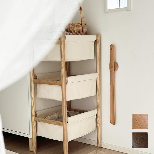 ナチュラルな天然木の靴ベラです。ナチュラルとブラウンの2つのカラーがあります。靴ベラのスタンド部分は、壁や靴箱に粘着シールまたは付属のネジで簡単に固定することができます。本体とスタンド部分にはマグネットが内蔵されているため、使用後は簡単に収...