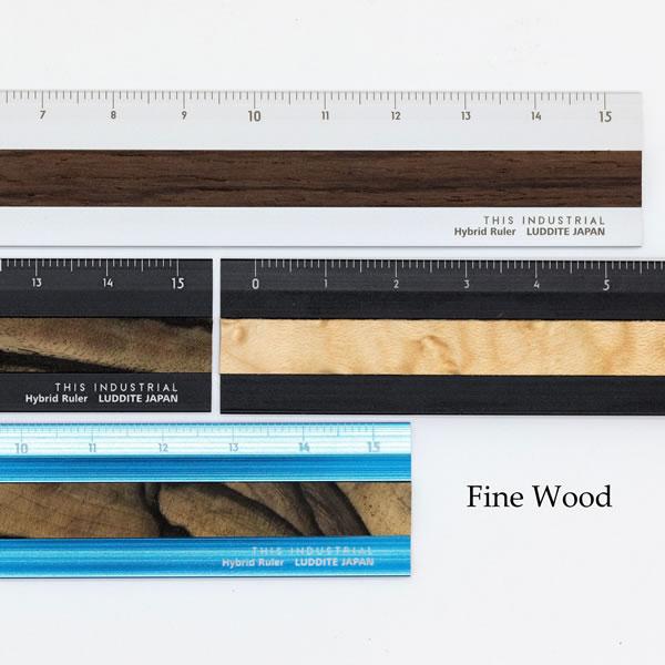 アルミと銘木のハイブリッド。銘木を採用した、薄く、軽く、美しい15cmの定規です。裏面の凹凸と傾斜により、指一本で軽く浮かせ、持ち上げられます。採用銘木■ペールムーンエボニー白紙に墨を垂らしたような杢目が特徴的な希少材■バーズアイメープル玉...
