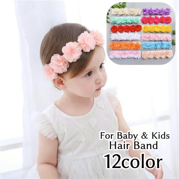 花冠のようなフラワーモチーフがかわいいベビー・キッズ用ヘアバンドです。普段使いはもちろん、ハーフバースデーなどの写真撮影用に、パーティーに大活躍しそうなアイテムですね！【サイズについて】画像をご参照ください。【カラーについて】生産ロットによ...
