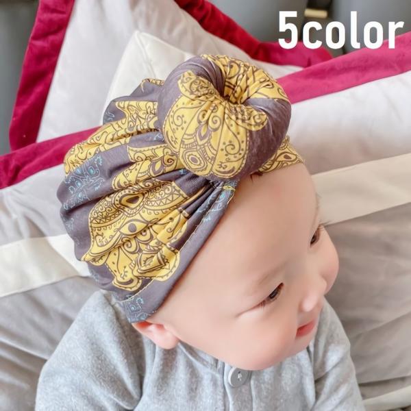 ベビー用の帽子です。バンダナをきゅっと結んだようなお団子風デザインがとってもかわいい♪お出かけに、記念撮影に活躍しそうです。【サイズについて】画像をご参照ください。【素材について】95%綿 5%ポリウレタン