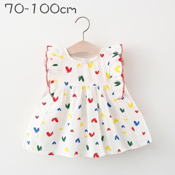 ハートの総柄が可愛い子供用ワンピースです。普段使いからちょっとしたお出かけにも◎【サイズについて】画像をご参照ください。【素材について】90%綿10%ポリエステル