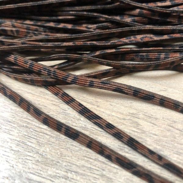 ヘアゴムやブレスレット、ヘアバンドなどアクセサリー作りに。手作りマスク用のゴムとしても。カラー レオパード  ヒョウ柄　ブラウン素材  ポリエステル　綿幅 フラット約3mm2m