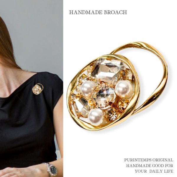 おしゃれでかわいいリングマグネットブローチA級ガラスビジューを使用し、パールと変形リングで上品で落ち着きのあるブローチにしました。卒業式やお呼ばれのときなどフォーマルスタイルにぴったり。バッグなどにつけてもかわいいブローチ。穴を開けない強力...
