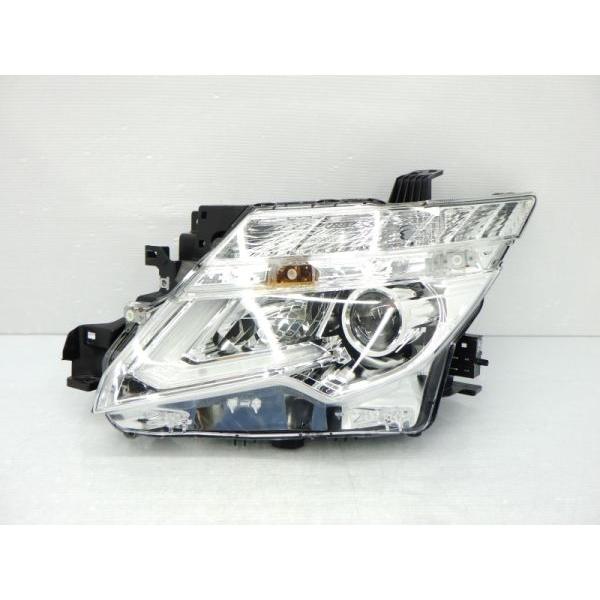 エルグランドTNE52 左ヘッドランプ　100-23674 PO エルグランド 2116842 E52 中期 左ライト LED KOITO 100-23674