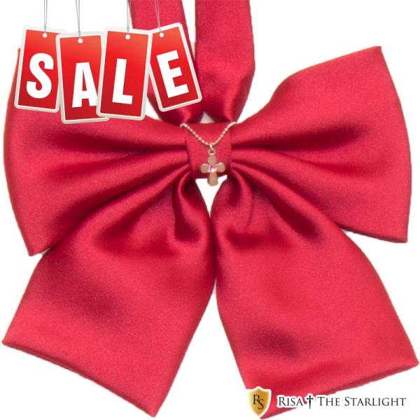 鮮やかな赤色にキラッとチャームが映える☆KURI-ORIのチャーム付き光沢無地リボンです。チャームは取り外すことも可能です。素材：ポリエステル100%※多少色味が異なる場合がございます
