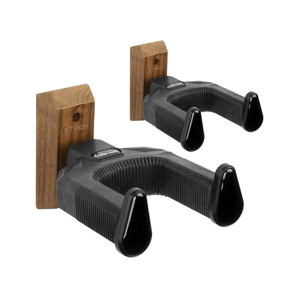 ユニークな素材 本物のブラックウォルナットを使用し、職人によって自然な美しい木目を保つように磨かれています。このギター壁掛けは、どんな室内空間にもクラシックなエレガンスを添えます 頑丈で強固 特別なデザインにより、耐荷重構造が強化されており...