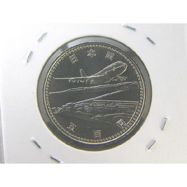 発行日　平成6年8月23日　発行枚数2,000万枚　直径26.5ミリ　量目7.2ｇ　銅75％/ニッケル25％　図案　関西国際空港と飛行機 ※撮像は見本です。同等品のご送付となります。