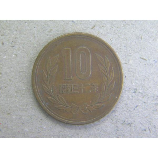 発行枚数5,000万枚　直径23.5ミリ　品位　銅950/亜鉛40/錫10　量目4.5ｇ