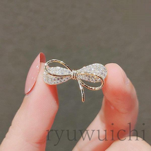 ブローチ 卒業式 入学式 アンティーク おしゃれ 北欧 入園式 カジュアル  リボンモチーフ ラインストーン キラキラ 輝き 大人可愛い デート