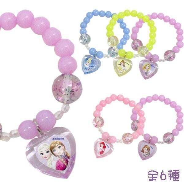 【ディズニー アクセサリー】ディズニープリンセスのビーズブレスレットです。中央にはプリンセスが描かれたぶら下がるタイプのハート型クリアチャームがついています♪【※ご注意事項】当店からメールが届かないお客様へ当店ではご注文をいただいてから翌営...