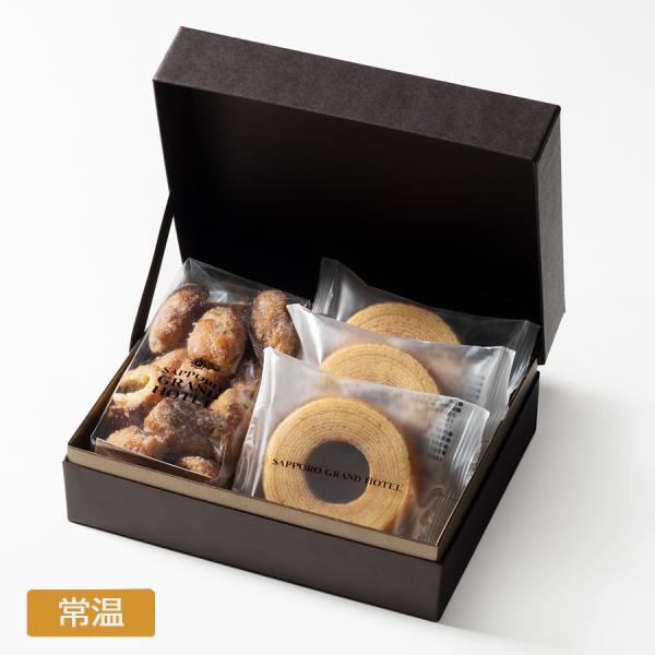 小麦粉、卵、生クリーム、バターは北海道産を使用しております。しっとりと味わい深いふんわりとした食感のバームクーヘンとシューラスクを詰め合わせました。＜商品内容＞　プレミアムバームクーヘン3個   シューラスク1袋＜賞味期限＞　製造日より30...