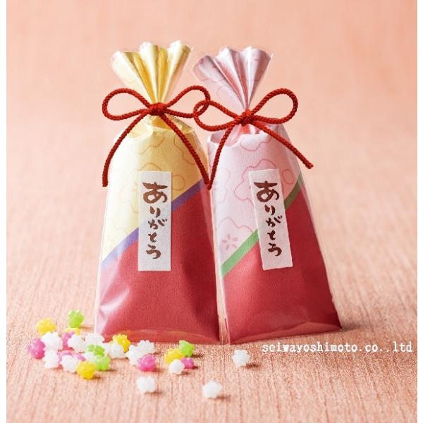 お配り用に喜ばれるスウィーツの和のプチギフト・はんなり金平糖　1袋京の舞妓さんをイメージするはんなりとした筒に、伝統の祝い菓子金平糖を入れてお届けします。金平糖約20g入り1個です。ラッピングはイエローとピンクの2色アソートです。色のご指定...
