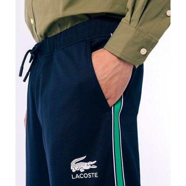 ラコステ　サイドラインスウェットトラックパンツ　ネイビー　42(M) LACOSTE（ラコステ） サイドラインスウェットトラックパンツ