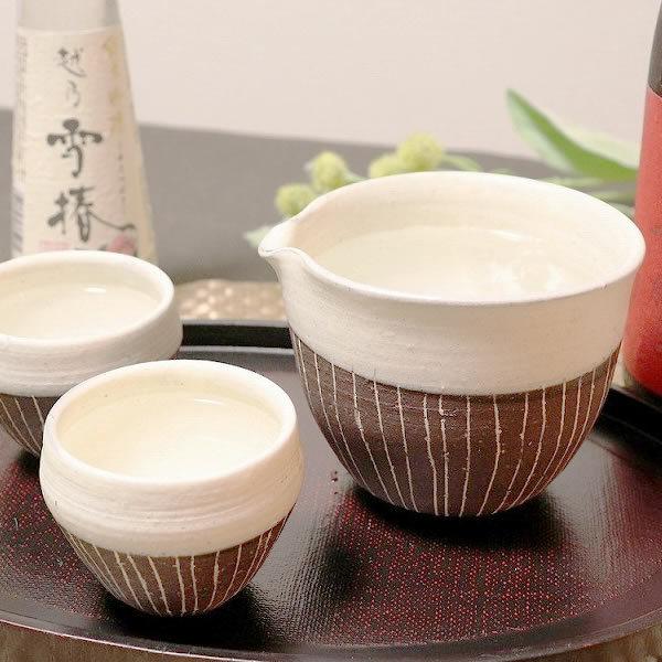 信楽焼 酒器セット 片口 冷酒器 陶器 酒器揃え 還暦祝い 父 おしゃれ ぐい呑みセット 和食器 日本製 徳利 おちょこ 焼酎 注器 白ライン酒器セット w318-04 :w318-04:しがらき - 通販 - Yahoo!ショッピング 信楽焼 酒器セット 片口 冷酒器 陶器 酒器揃え 還暦祝い 父 おしゃれ ぐい呑みセット 和食器 日本製 徳利 おちょこ 焼酎 注器 白ライン酒器セット w318-04 :w318-04:しがらき - 通販 - Yahoo!ショッピング