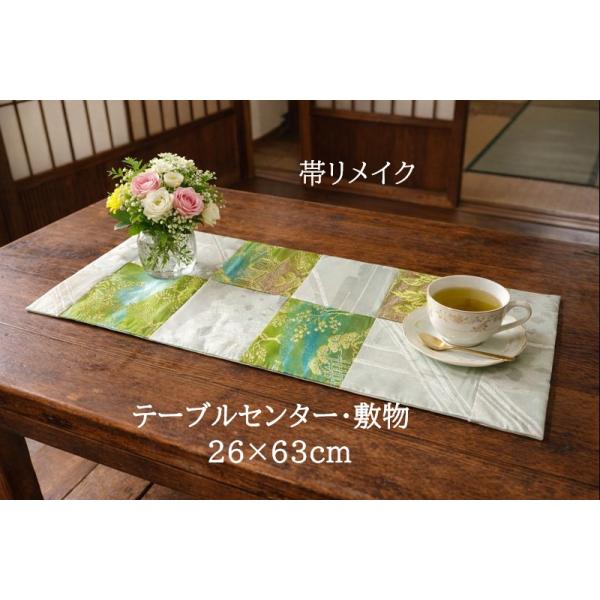 ■画像にある小物(小物や人形・花など)は商品に含まれません。◆アンティーク帯を使用したリメイク品です。■素材---正絹■サイズ---【cm】幅約26　長さ約63■帯を繋いでリメイクいたしました。玉虫色の帯地とシルバー系の帯地を交互につないで...