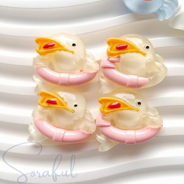 デコパーツ 海のシリーズ クリアカラーのイルカ 4個 貼付けパーツ D-0120