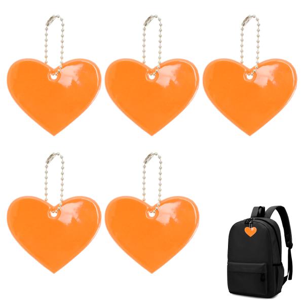 【本商品は海外出荷】お届けは通常20-30日を頂いております。【商品仕樣】スタイル：ハート型 / カラー：薄いオレンジ / サイズ：6.5x5.5cm(同色5個入り)【視認性を高める】反射効果で視認性を向上させ、夜間の安全を守ります。特に自...