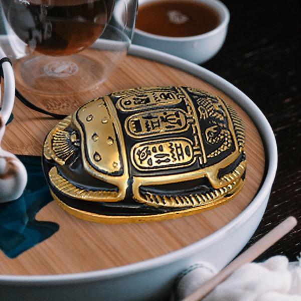 説明:コガネムシのお土産の置物は.樹脂素材で製造されており.耐久性があり.長期間使用できます.コガネムシのモデリングはユニークで.デスクトップの装飾として家のどこにでも置くことができます.優れた職人技は.創造的でユニークな絶妙なディテールと...