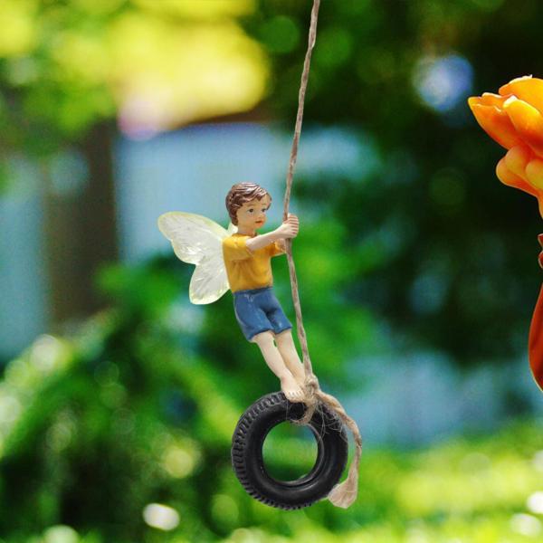 説明:[タイヤブランコに乗った男の子の装飾]: 小さくて素敵な男の子をテーマにしたアクセサリー.この庭の彫像は.タイヤに乗った楽しく絶妙な妖精の男の子のデザインが特徴で.庭の装飾に最適です.[信じられないほどのディテール]: 軽量のミニチュ...