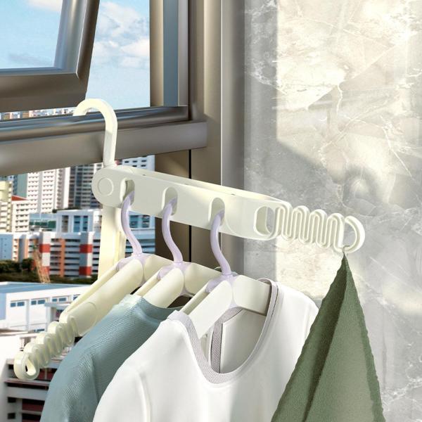 説明:[ポータブルデザイン]: 折りたたみ式洋服ハンガーは小型で軽量.折りたたみ可能で.旅行.アウトドア.ホテル.アパートに適しています. [素材]: 折りたたみ式トラベルハンガーは丈夫な ABS 素材で作られており.変形しにくく.衣類を整...