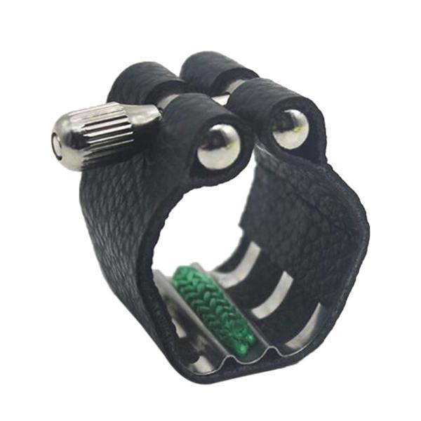 説明:アルトソプラノテナーサックスラバーマウスピース用の人工皮革の留め具.人工皮革製.耐久性があり.うまく機能します.きれいな音が付属しています.ゴム製マウスピースを備えたサックス用に設計されています.サイズチャート:サイズ:2cm / 0...