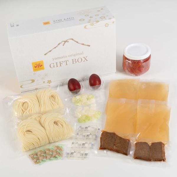 焼肉冷麺ヤマトの冷麺セットです。コシのある生麺、コクのあるストレートスープ、当店自慢のカクテキ、具材が入ったセットとなります。化粧箱に入っておりますので、大切な方へのご贈答へもぴったりの一品となります。