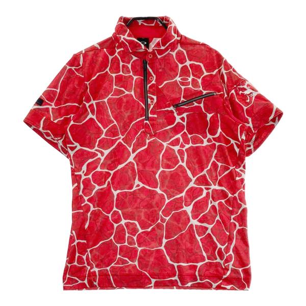 サイズ：XL OAKLEY オークリー  半袖ポロシャツ スカルタグ 総柄 レッド系 [240101474067] ゴルフウェア メンズ ストスト OAKLEY オークリー 半袖ポロシャツ 総柄 レッド系 XL ゴルフ