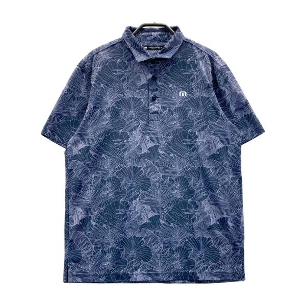 サイズ：M TRAVIS MATHEW トラビスマシュー 7AJ020 半袖ポロシャツ 総柄 ネイビー系 [240101671399] ゴルフウェア メンズ ストスト TRAVISMATHEW トラビスマシュー 7AJ020 半袖ポロシャツ 総柄 ネイビー