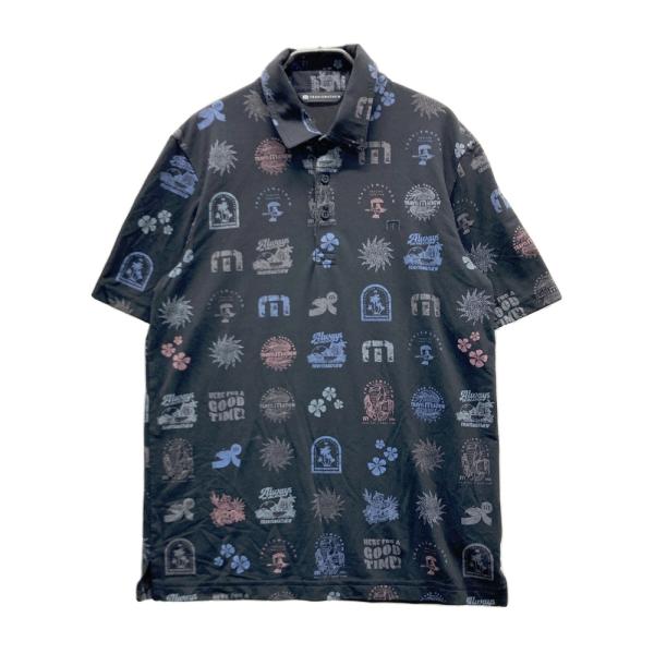 サイズ：L TRAVIS MATHEW トラビスマシュー  半袖ポロシャツ 総柄 ブラック系 [240101725953] ゴルフウェア メンズ ストスト TRAVISMATHEW トラビスマシュー 半袖ポロシャツ 総柄 ブラック系 M