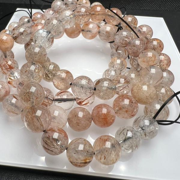 ランダム発送１連37-38cm分腕周り16cmブレスレット2本お届け鉱物名フォリエテェットマイカインクォーツ水晶にマイカ(雲母)がブラウンやブラック、ブロンズの針がルチルのように光りの反射で美しいメタリックな輝きを放ち、深い癒しのエネルギー...