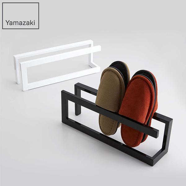 山崎実業のスリッパラック。ホワイトとブラックがあります。山崎実業は、「ワクワクする心に従い行動する。」という理念に基づき、製品を通じて社会に、ほんの少しの感動と驚きを創造することを目指している会社。暮らしを彩るインテリア雑貨の専門メーカーで...