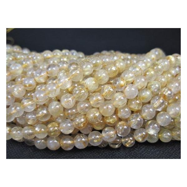 【連売り商品】ゴールドルチルクォーツ☆商品情報☆石サイズ：Φ5.5±0.2mm粒数：約66粒長さ：約39cm原産地：ブラジル※画像一枚目は室内撮影となります。以下は屋外にて撮影したものとなります。※サイズのばらつきがあります。また、透明感の...