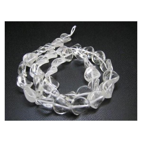 【連売り商品】水晶コインカット☆商品情報☆直径：Φ12±0.2mm厚さ：5±0.2mm粒数：約34粒一連：約40cm原産地：ブラジル※形状やサイズのばらつき、表面や穴周りにキズや凹み等があります。粒数はあくまで目安です。多少の誤差があります...