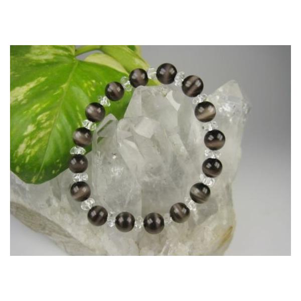 【ブレスレット】キャッツアイ（人工石）＋カット水晶☆商品情報☆キャッツアイ（人工石）：Φ8±0.2mm×16粒カット水晶：Φ6×3mm×16粒手首周り：約16.5cm※形状やサイズのばらつき、表面や穴周りにキズや凹み等があります。色味や模様...