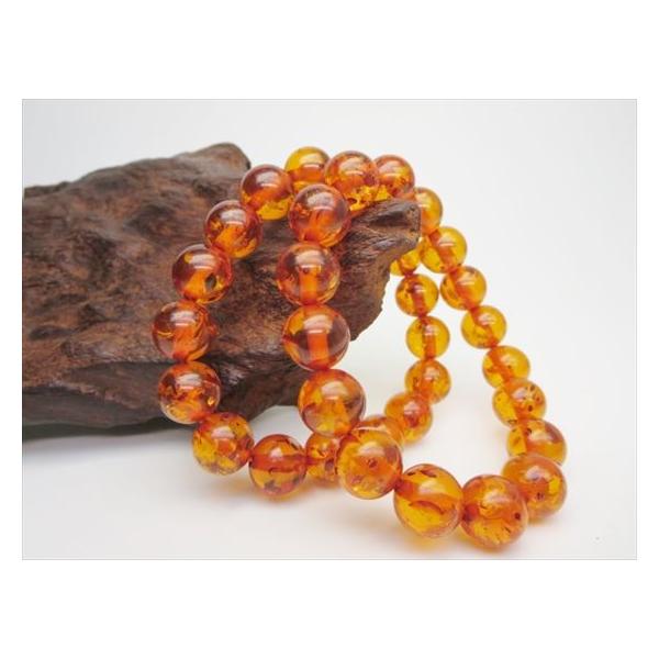 【残1】アンバー(天然樹脂琥珀)のブレスレット珍しいレッド　円周22cm 新品 残1】アンバー(天然樹脂琥珀)のブレスレット珍しいレッド 円周