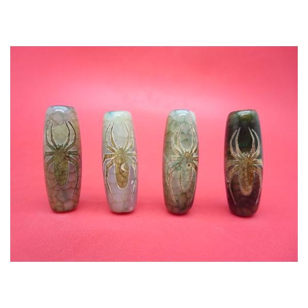 【チベット高級龍紋天珠】福寿蜘蛛天珠☆商品情報☆長さ：約39-40mm直径：約Φ13-14mm穴サイズ：約Φ2.5mm中国・チベット天珠※形状やサイズのばらつき、表面や穴周りのキズや凹み、穴の変形や位置ずれ等があります。※商品は選べませんの...