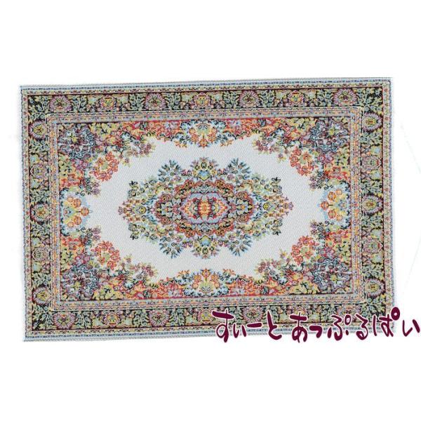 トルコ製のドールハウス用ミニチュアラグです。柄はプリントではなく、機械織りで表現されています。左右の端には、白いフリンジが付いています。大きさは100ｘ150ｍｍです（両端のフリンジの部分含まず）。厚みは意外にありませんので、コースターなど...