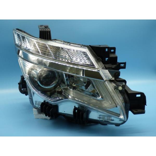 ①エルグランドTNE52 右ヘッドランプ　100-23674 PO エルグランド DBA-TNE52 右ヘッドランプ/ヘッドライト ライダー 黒